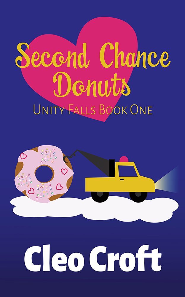 Cover of Second Chance Donuts by Cleo Croft. Vector art. Blue background. Title in yellow script in front of a large heart. A cartoon illustration of a tow truck pulls a giant pink donut.